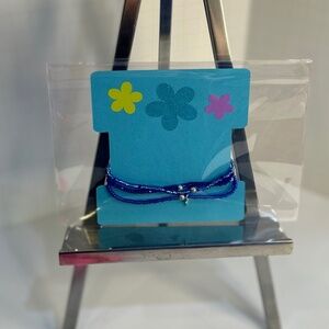 3 Stackable Glass Bead Stretch Bracelets in blue hues, one w/ micro silver cross